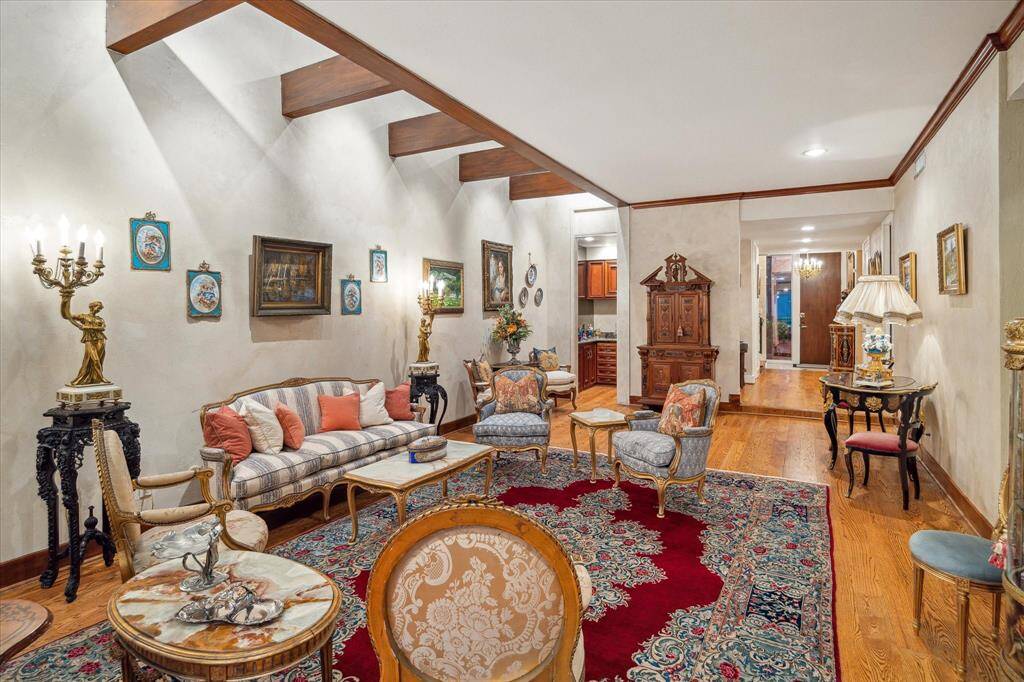 The formal living room and wet bar create the perfect flow for hosting.