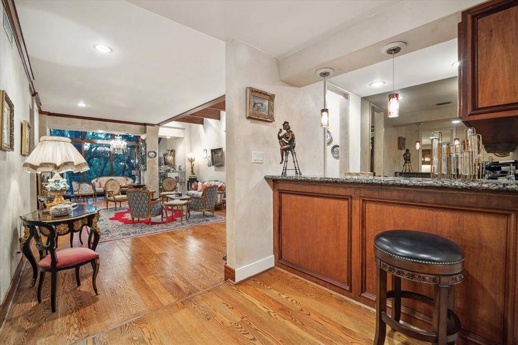 The grand wet bar adjacent to the formal living room.