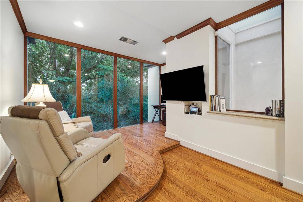 Luxurious sitting area in the primary suite offers elegance and comfort.