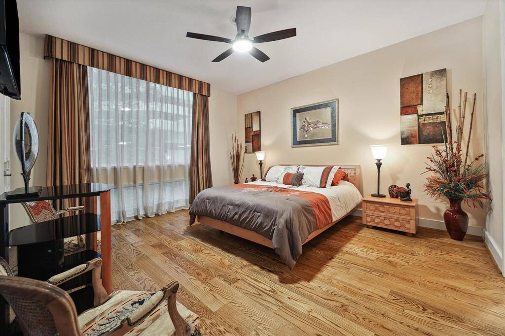 Two well-appointed secondary bedrooms share a Hollywood bath and have private closets.