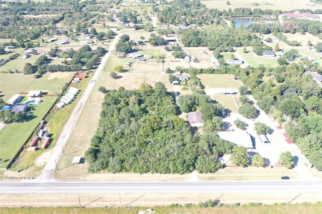 Perfectly located 4 acre track offers 300 ft of frontage directly off 2920 1 mile down from 290.