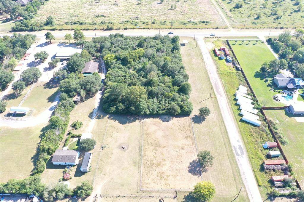 This expansive 4 acre property has endless potential with residential and or commercial use options.