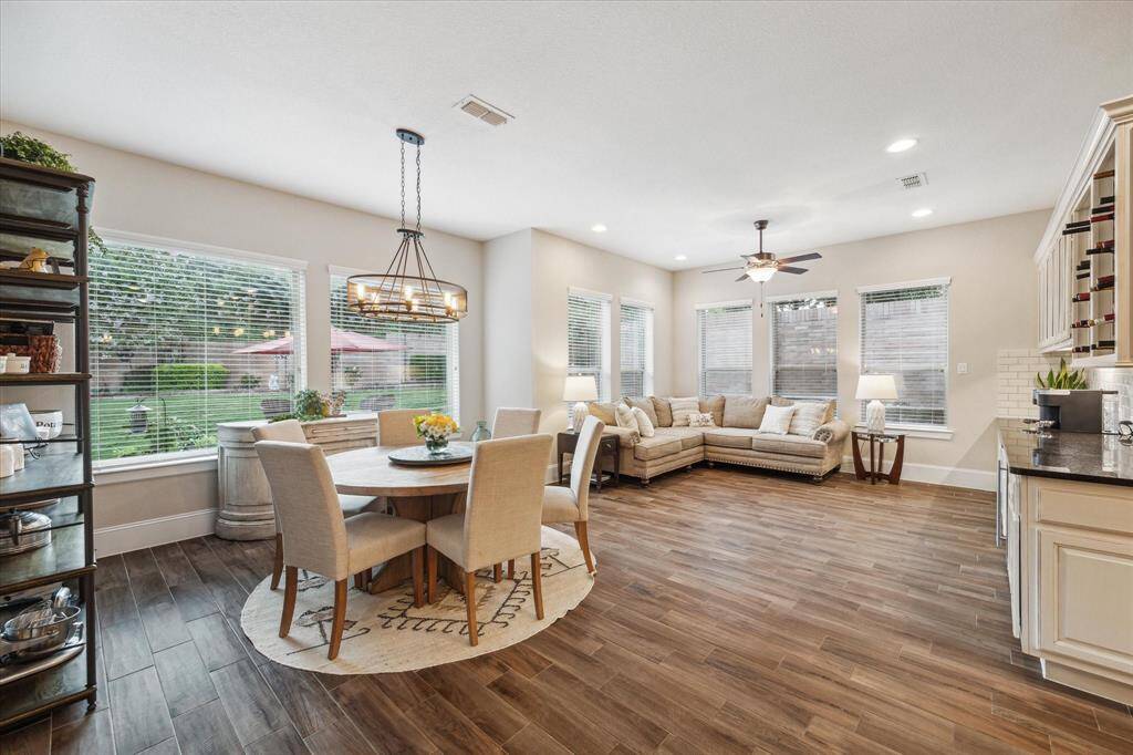 This sunroom and breakfast area incorporates the best space for living and dining!