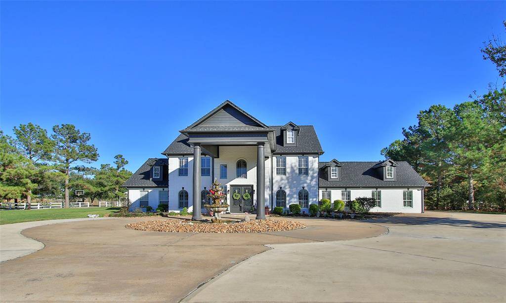 Welcome home to this fabulous spacious home located on 10.5+/- acres in an exclusive gated community.