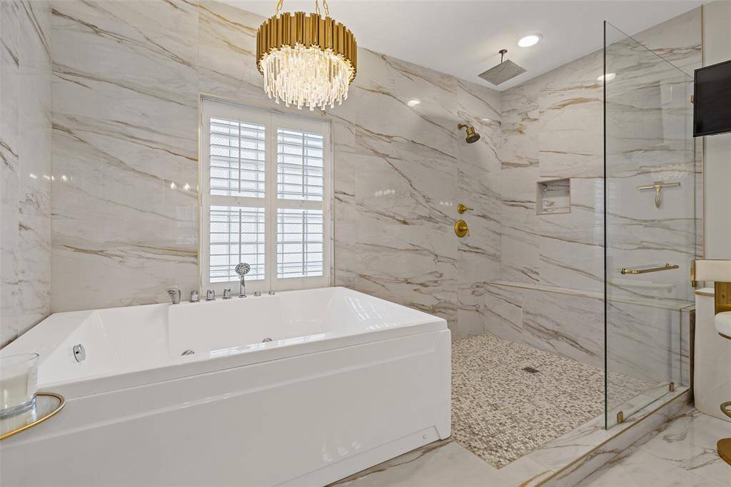 Soak and unwind in your large soaking tub with jets or take a shower in the huge walk in shower!