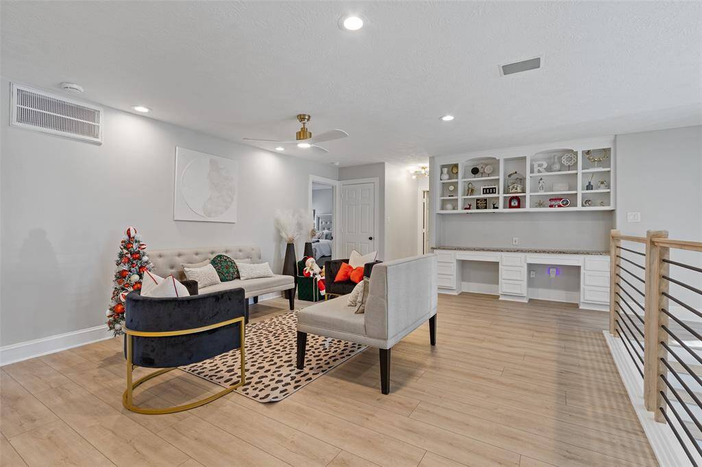Upstairs living room, play room or whatever your family's needs are. The built in desk is the perfect place for the kids to do their homework!