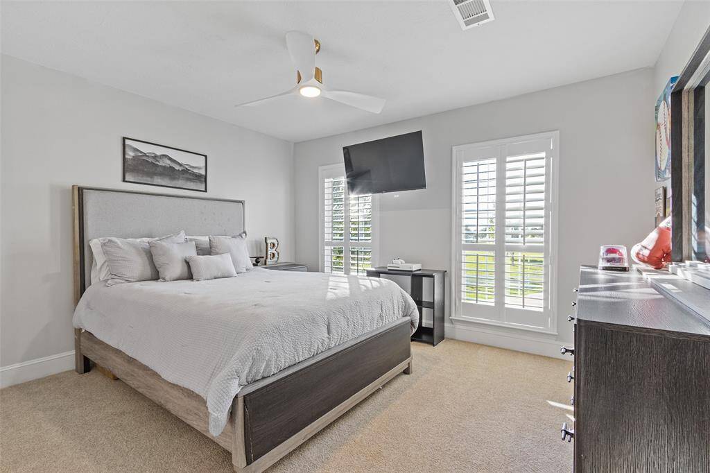 Another large secondary bedroom upstairs.