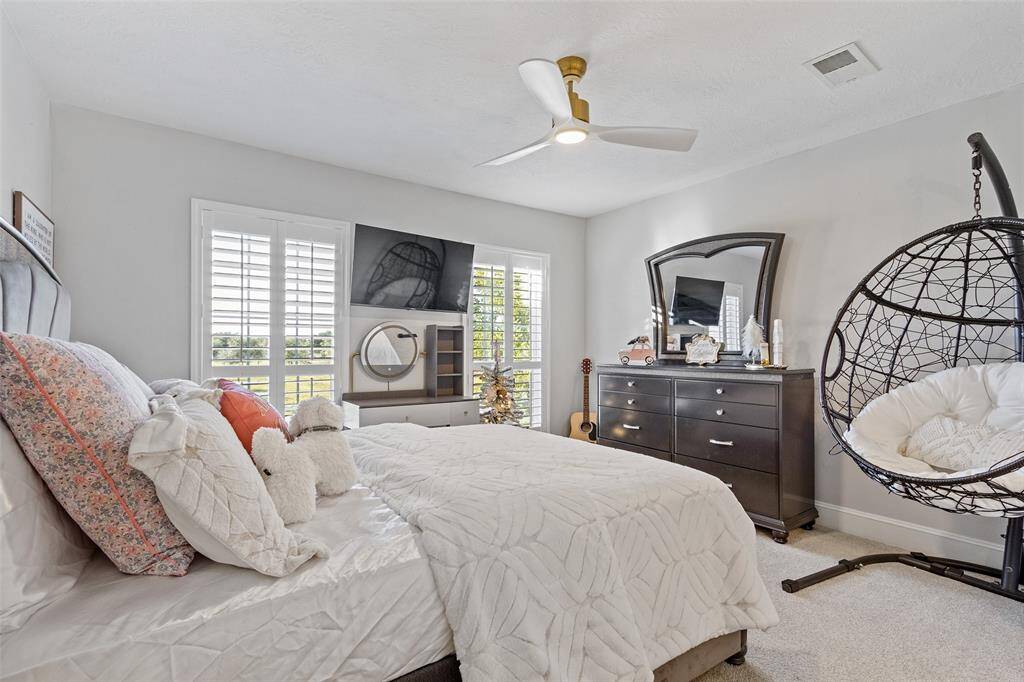 Another secondary bedroom upstairs.  This house is ready for your large families!