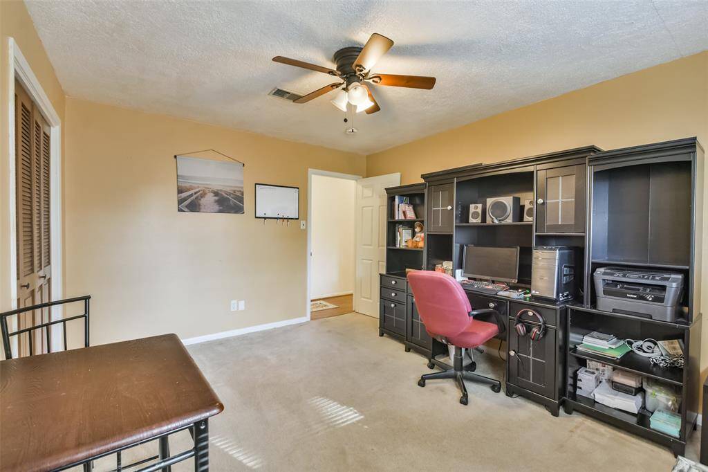 This 2nd bedroom is ideal for a home office or study area, along with a closet for ample storage