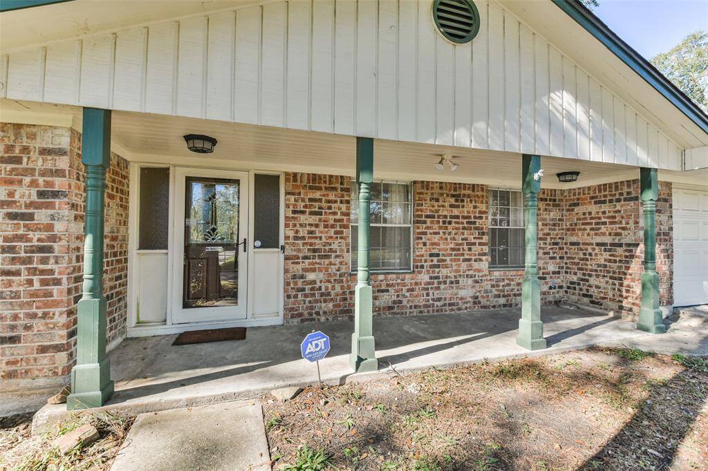 Welcome to 1805 Twila Lane! This charming brick home greets you with a spacious covered front porch, classic details, and a peaceful tree-lined setting, offering a warm and inviting entry to your next home.