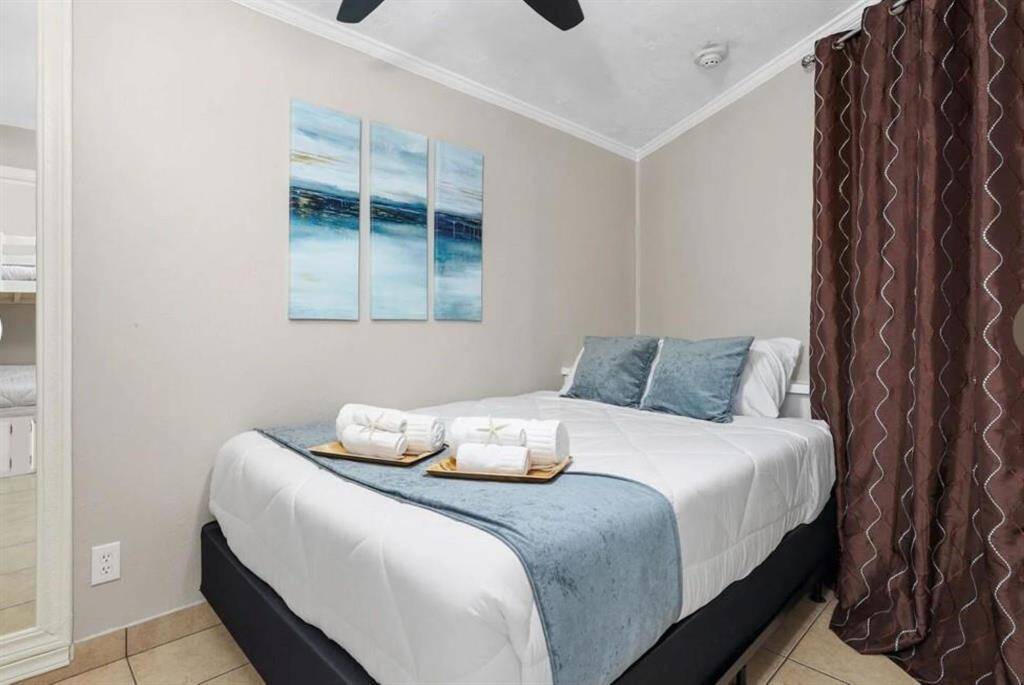 Enjoy a night of rest in this cozy bedroom.