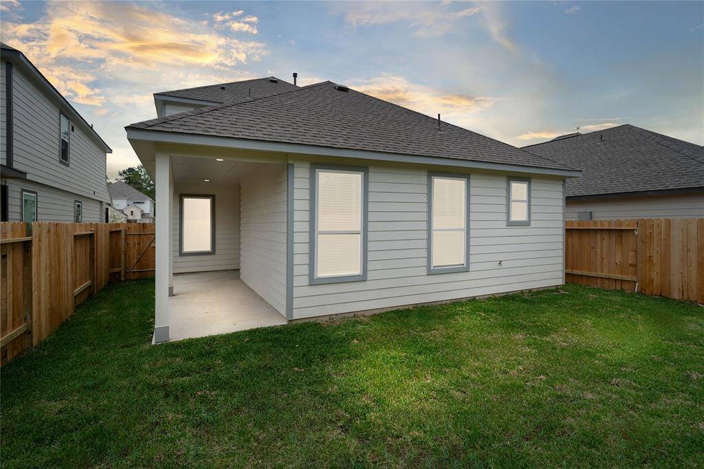 This amazing backyard with its covered rear patio provides enough space for many activities! From fun summer outdoor parties, to roasting marshmallows in the winter, this gorgeous backyard gives you the ability for many days/nights of memories!