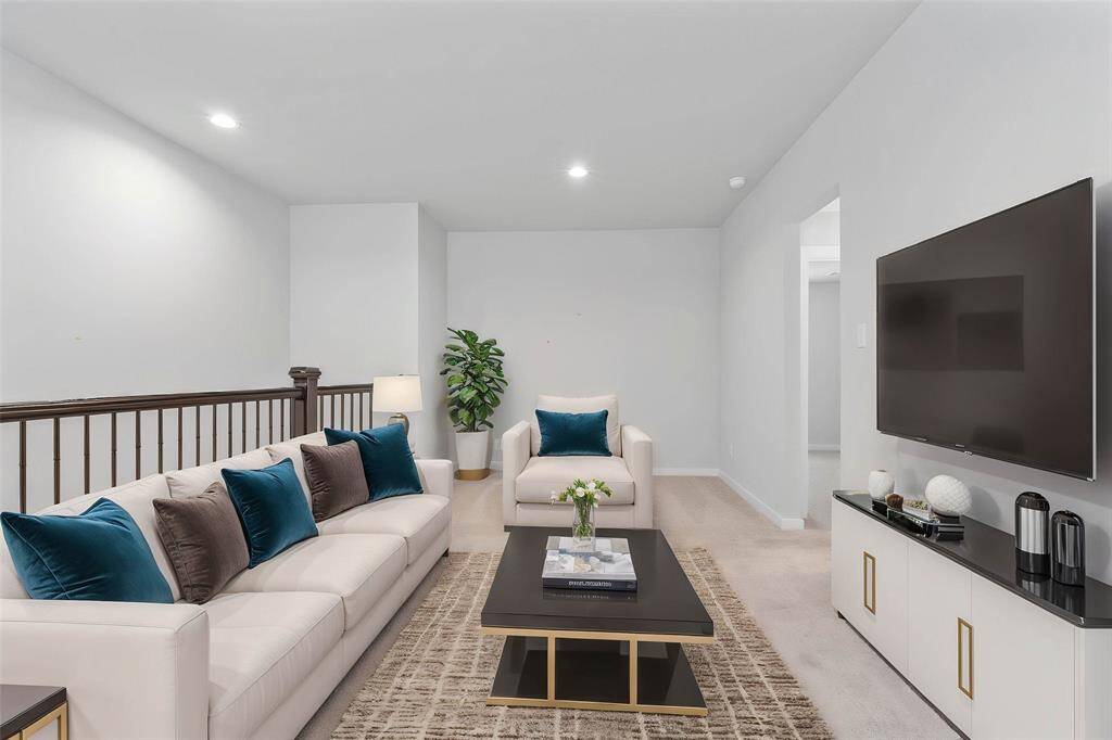 Perfect for entertaining is this amazing loft! Featuring plush carpet, high ceilings, recessed lighting, and custom paint!