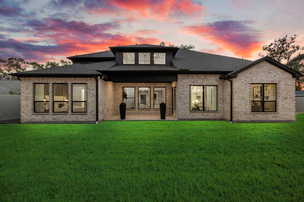 9406 Willowview Completed Home Photo with example of Backyard Sod. Sod not included in home.
