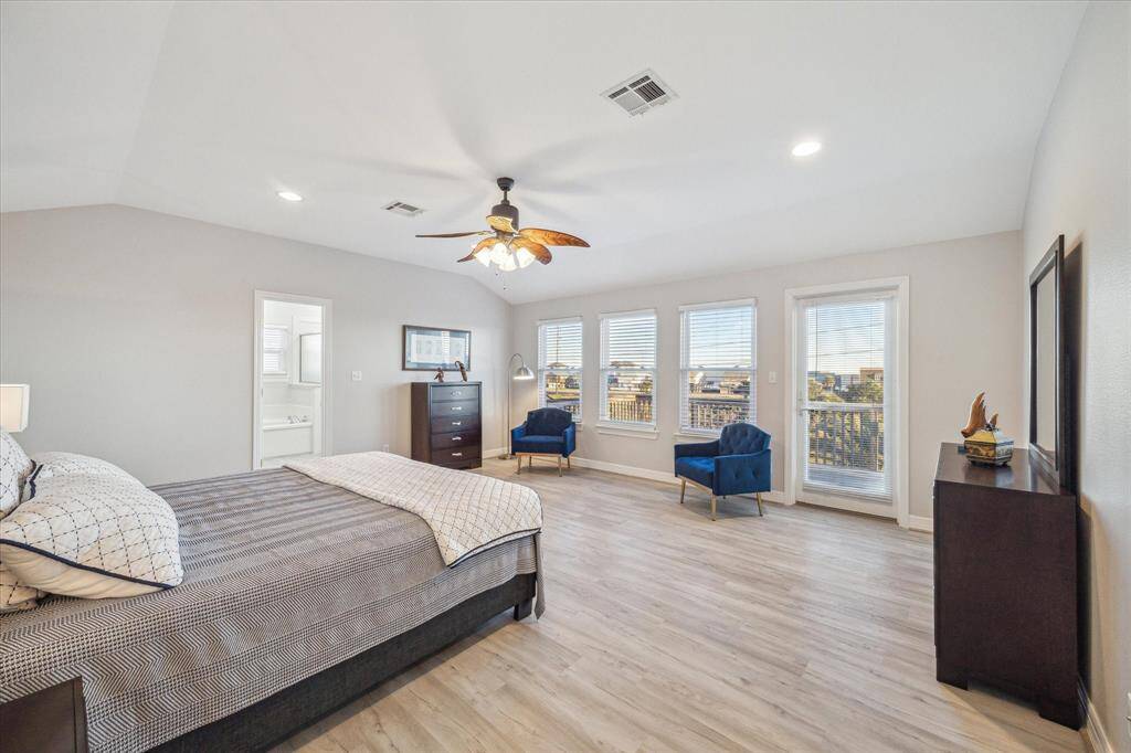 Upstairs is your gargantuan owner's retreat, with plenty of room for all of your furniture and a huge sitting area with views of the Gulf.