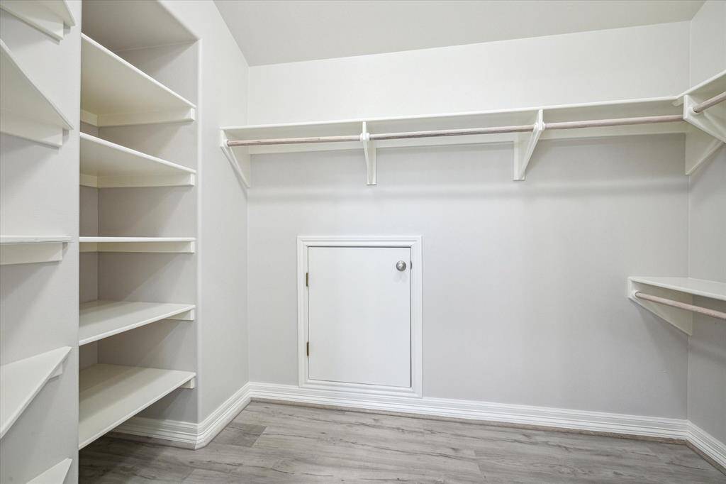 If all of that wasn't enough, here is your huge primary closet.