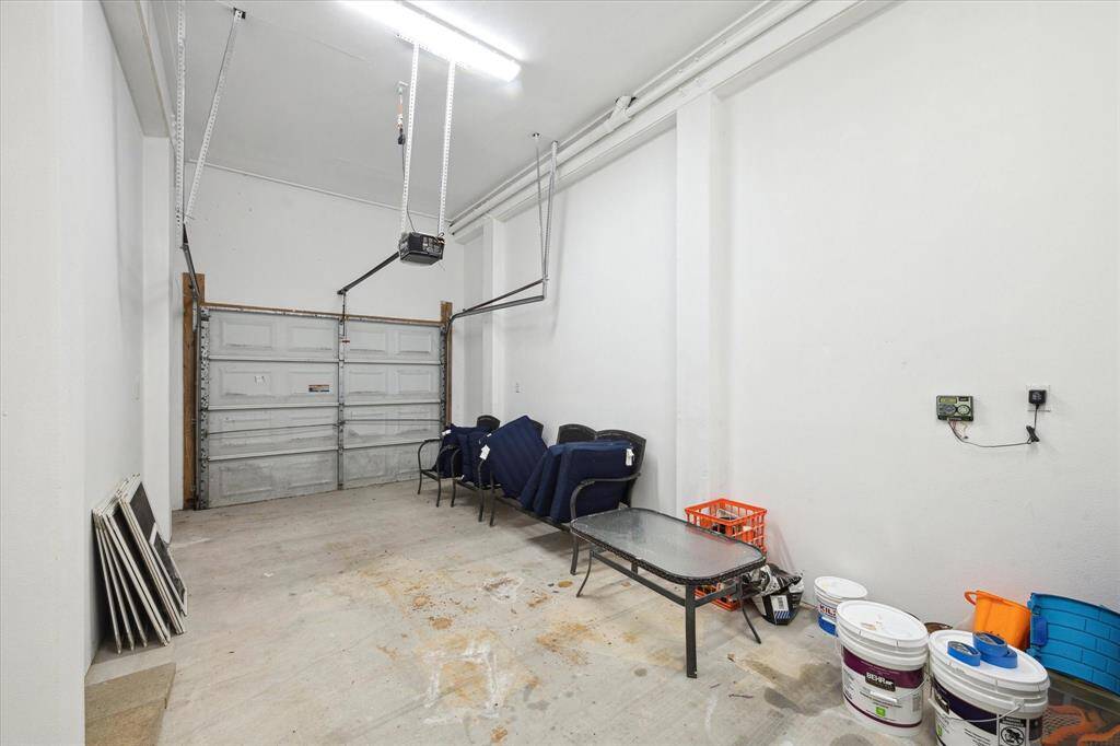 Oversized one car garage, which also houses the sprinkler system controls.