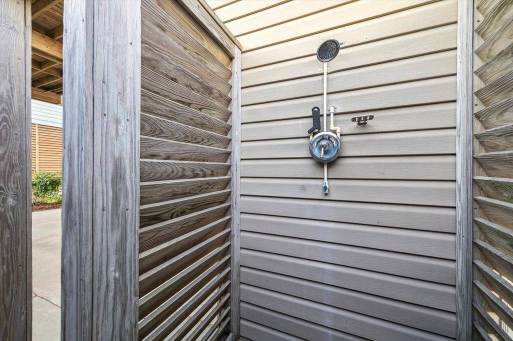Rinse off in your outdoor shower after the many days you will be spending at the beach before heading upstairs.