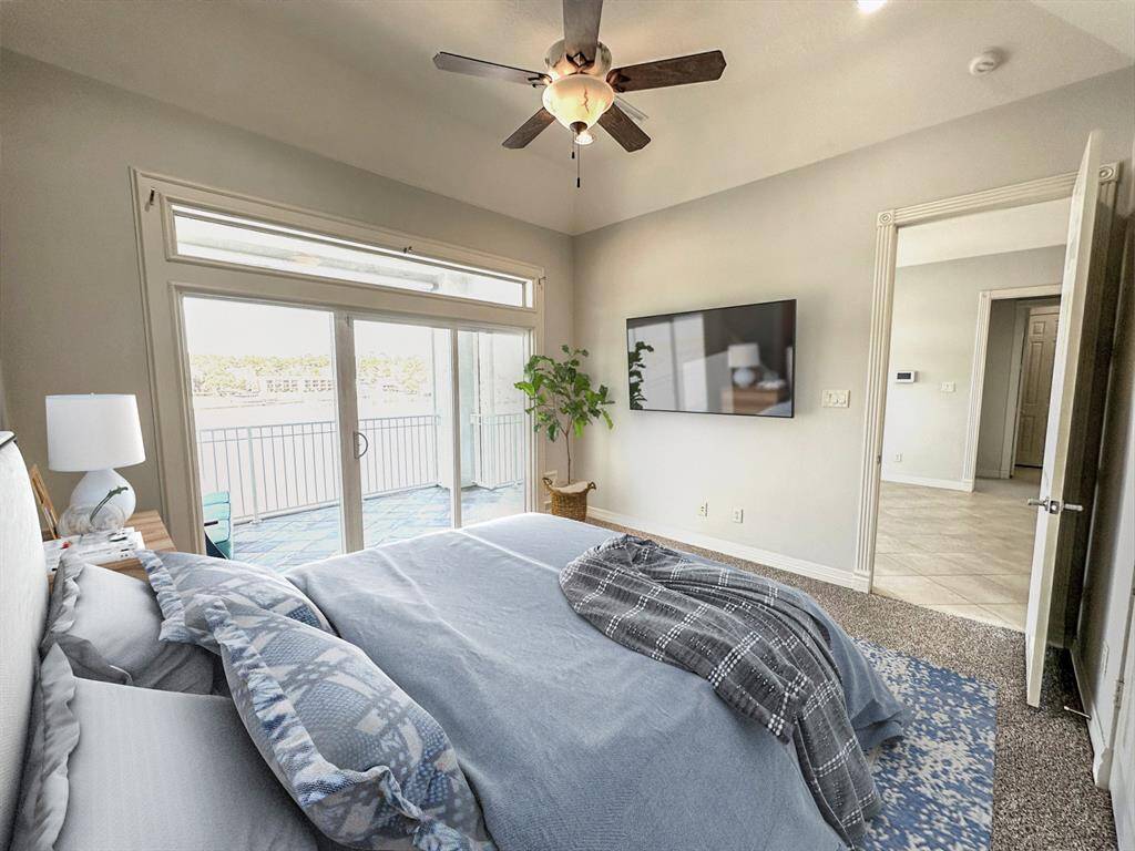 Another view of the primary bedroom. virtual staged