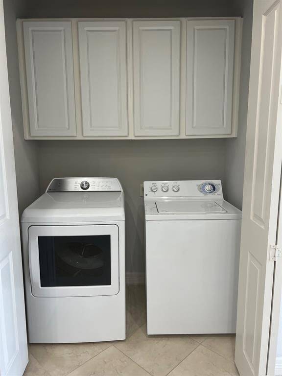 Utility inside condo with Full size Washer and Dryer that are included with the condo.