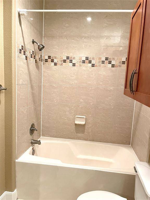 Second bath has a tub.