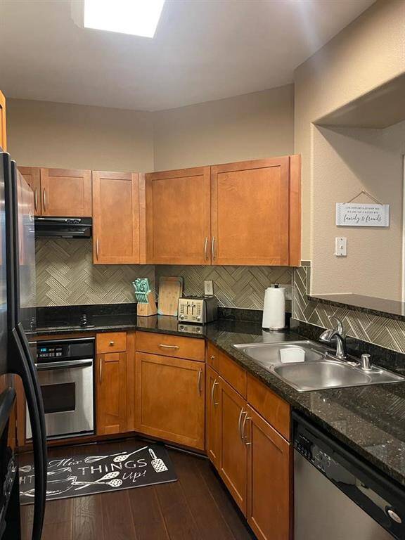 Kitchen with stainless steel appliances.