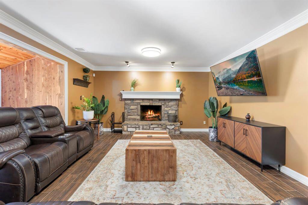 Ample space in the living room for family and friends to enjoy then fire