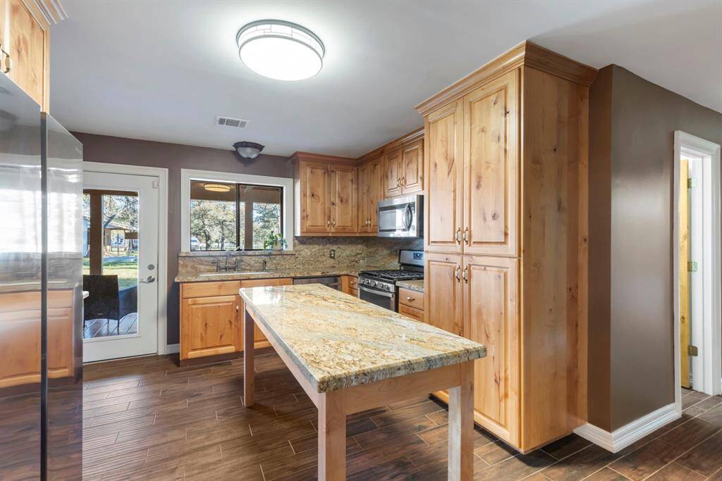 Kitchen is a separate room, open to the living room