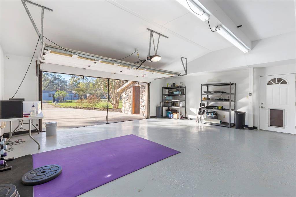 Surprisingly ample breeze passes through the garage when the back door is open to create an awesome gym or extra flex space if needed.