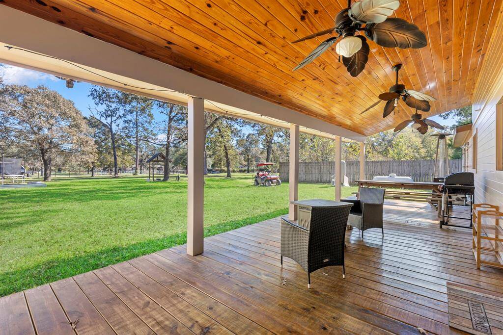The back covered porch offers some amazing views of the property