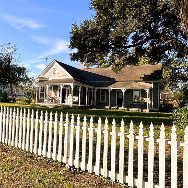 Surrounded by a picket fence
