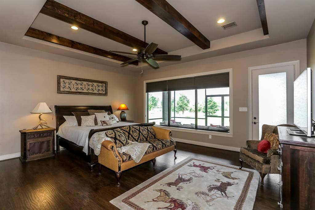 Master suite is stunning with private screened in porch and views of the pool
