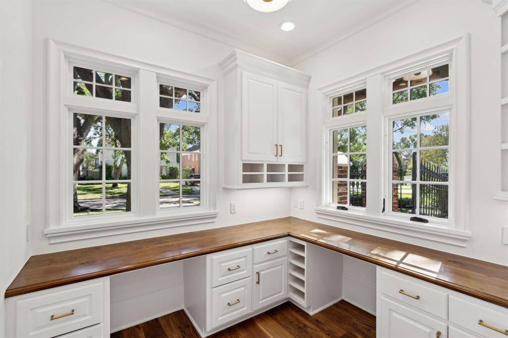[Computer Room]. Off the mudroom, this is the perfect office for keeping the household organized or for a computer room with 2 built in desks
