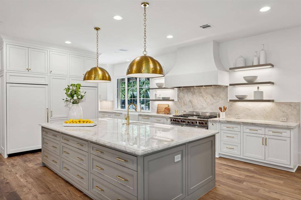 [Kitchen]. The oversized island is a dream for entertaining