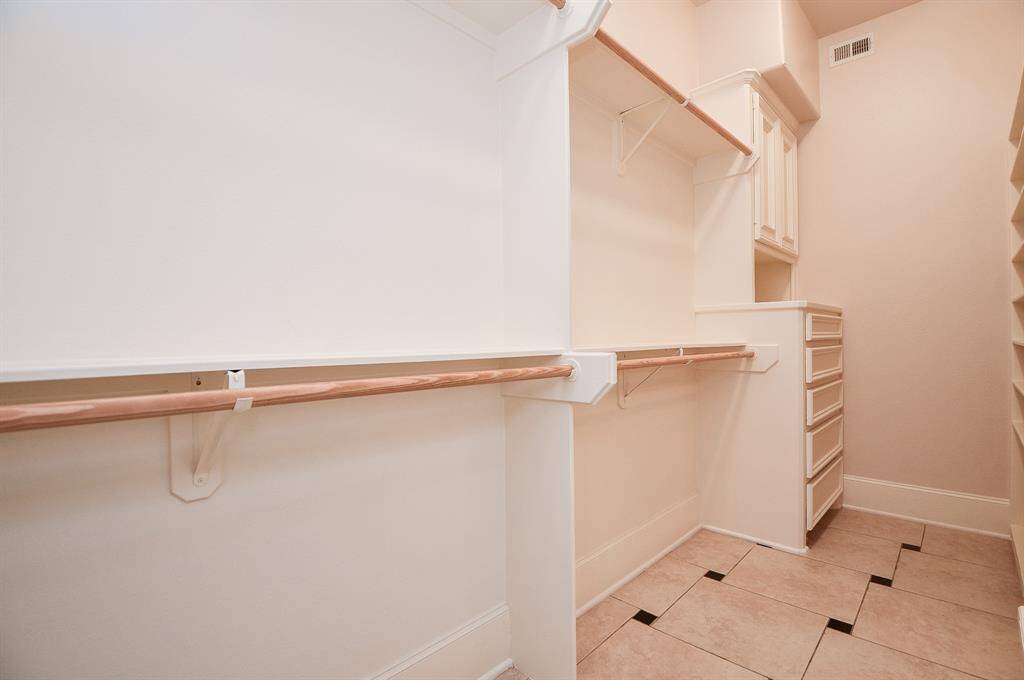 Primary walk in closet.