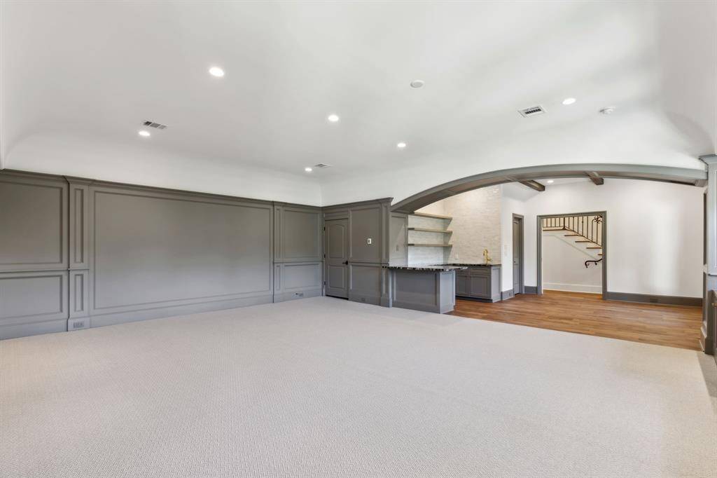 [Media Room]. Prewired for a projector, speakers and subwoofer.