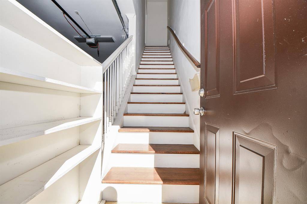 Solid oak stairs to the guest quarter.
