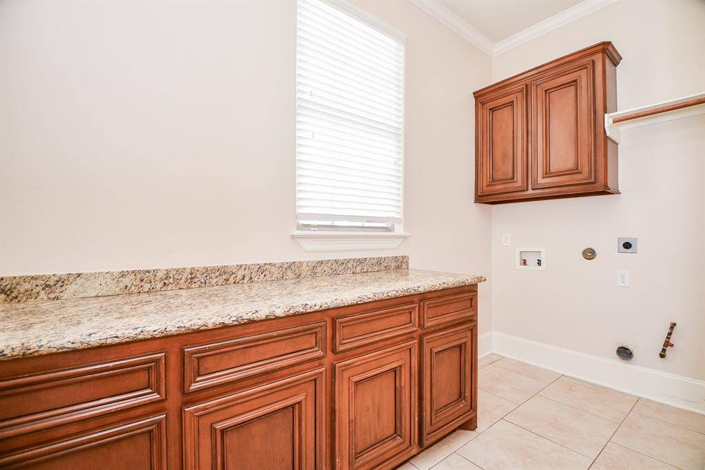 Laundry room at main house with folding counter.