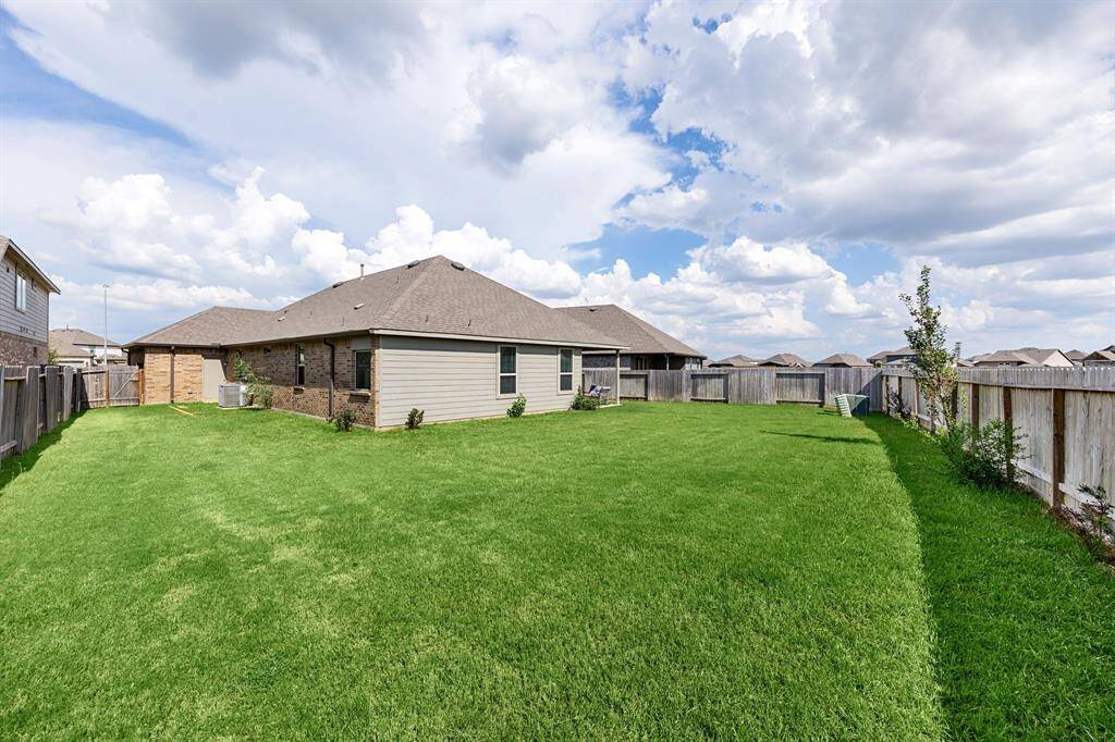 Enjoy the lush green space with plenty of room to add a pool if you wish!