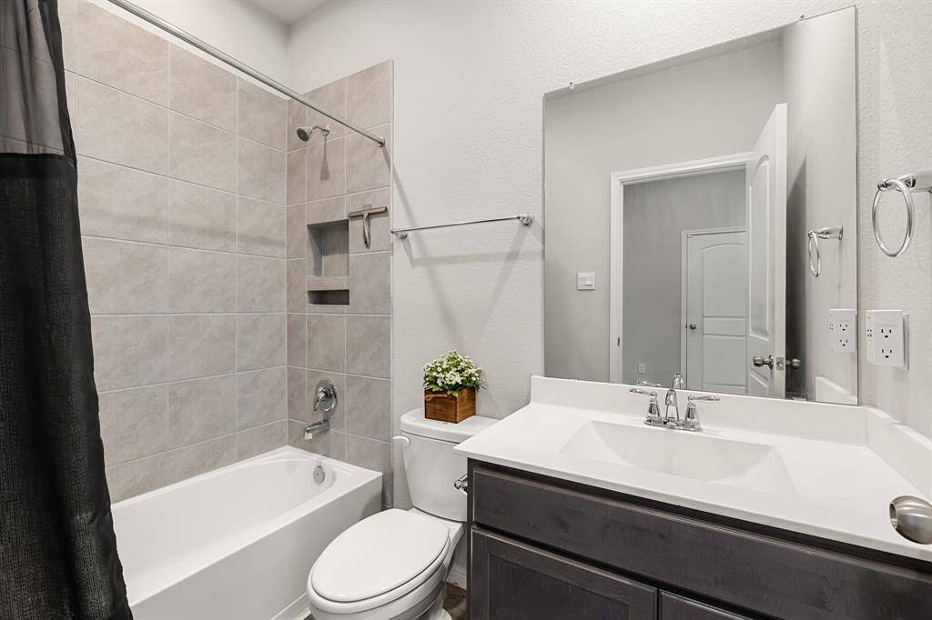Secondary bathroom is situated between the front guest room and the study.