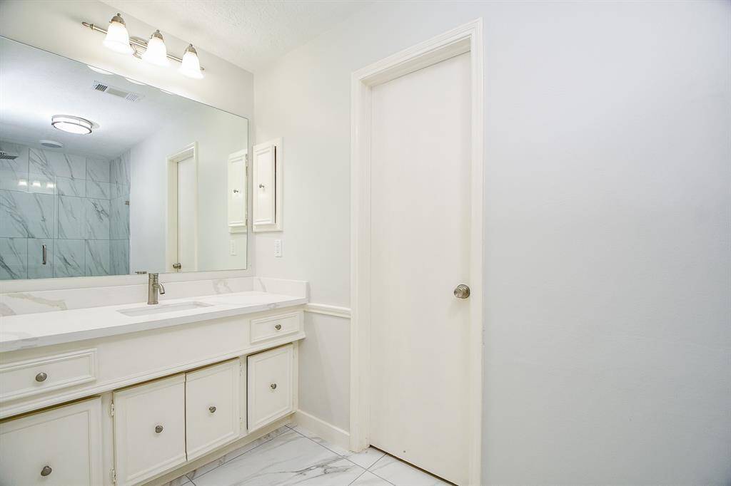 Second vanity in Primary Bath, shower reflection in mirror