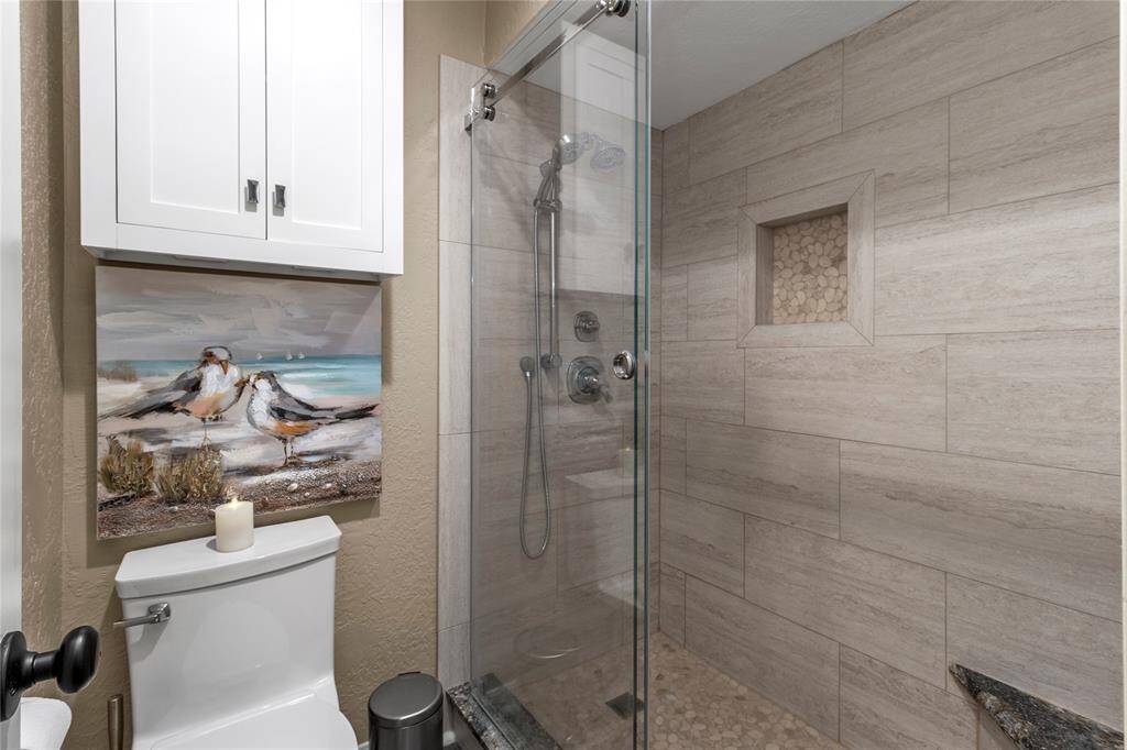 SPA-LIKE BATH WITH WALK-IN TILE SHOWER! FRAMELESS GLASS DOOR! EVERYTHING RECENTLY UPDATED! ALL FURNISHINGS INCLUDED!