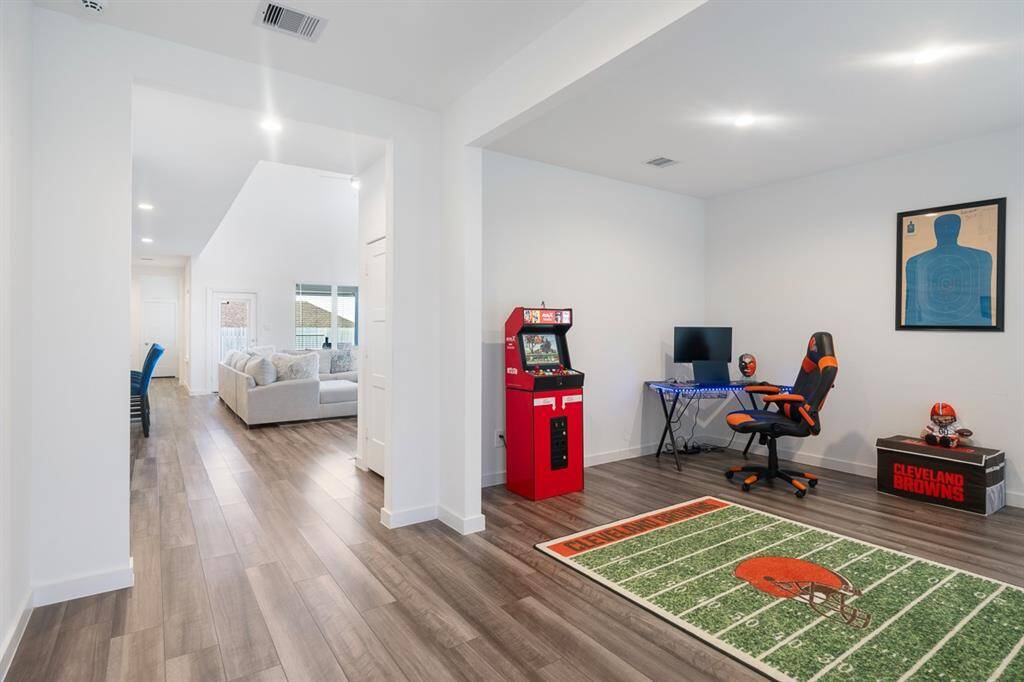 This room offers multi-function options - dining room, living area or a study, which the seller is using this room as a study.