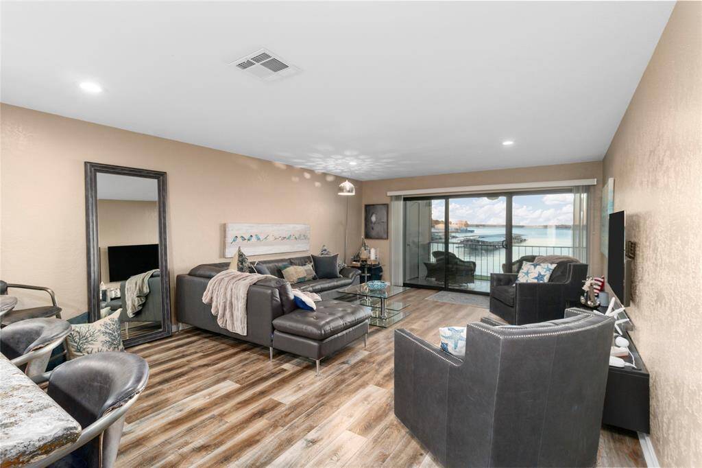OPEN WATER VIEW OF LAKE CONROE FROM YOUR PRIVATE BALCONY! IMAGINE RELAXING DAYS & STARLIT NIGHTS IN THIS FABULOUS LIVING AREA! ALL FURNISHINGS INCLUDED!