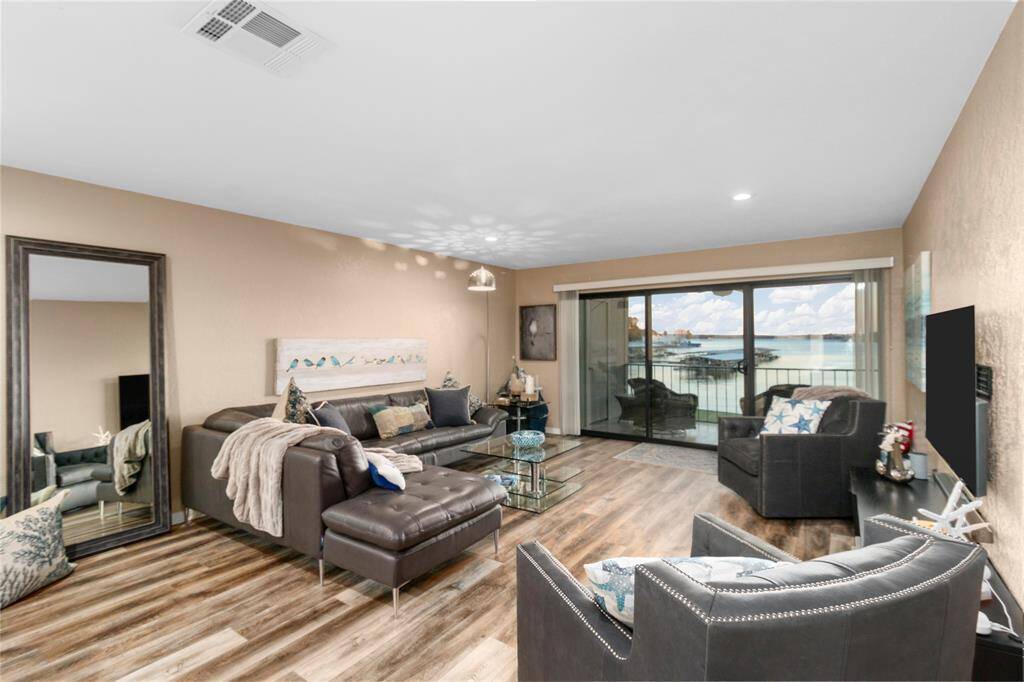 OPEN WATER VIEW OF LAKE CONROE FROM YOUR PRIVATE BALCONY! IMAGINE RELAXING DAYS & STARLIT NIGHTS IN THIS FABULOUS LIVING AREA! ALL FURNISHINGS INCLUDED!