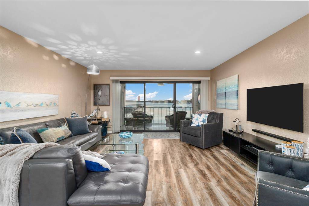 OPEN WATER VIEW OF LAKE CONROE FROM YOUR PRIVATE BALCONY! IMAGINE RELAXING DAYS & STARLIT NIGHTS IN THIS FABULOUS LIVING AREA! ALL FURNISHINGS INCLUDED!