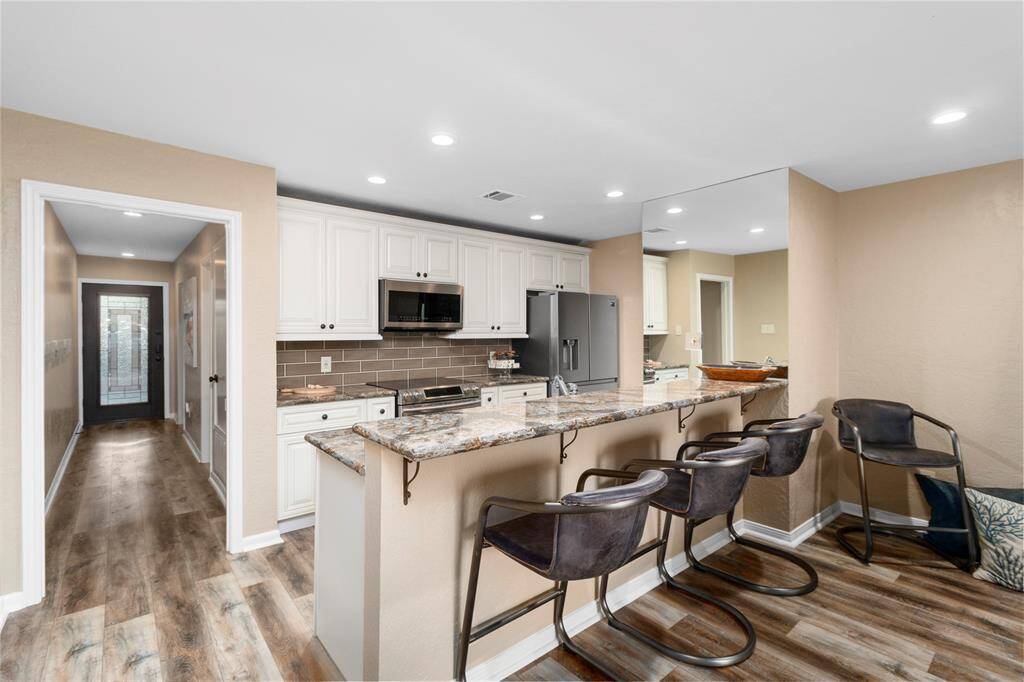 $100,000 IN RECENT UPDATES! PLENTY OF SPACE TO ENJOY YOUR LAKE CONROE STAYCATION LIFESTYLE! ALL FURNISHINGS INCLUDED!