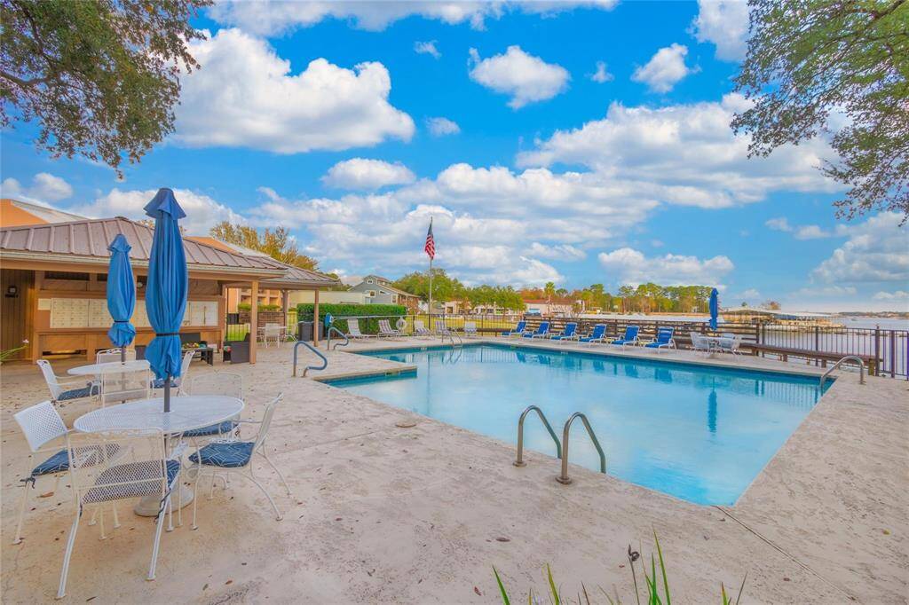 COMMUNITY POOL & OPEN WATER VIEW OF LAKE CONROE! GATHERING AREAS & COMMUNITY MAILBOXES! GORGEOUS OLD GROWTH TREES!