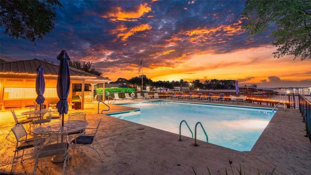 COMMUNITY POOL & OPEN WATER NIGHT SKY VIEW OF LAKE CONROE! GATHERING AREAS & COMMUNITY MAILBOXES! GORGEOUS OLD GROWTH TREES!