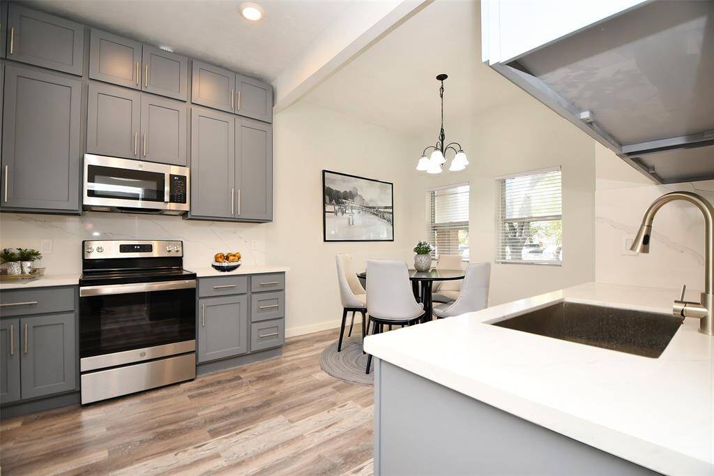 Remodeled Kitchen and Breakfast Area with all new cabinets, appliances and fixtures